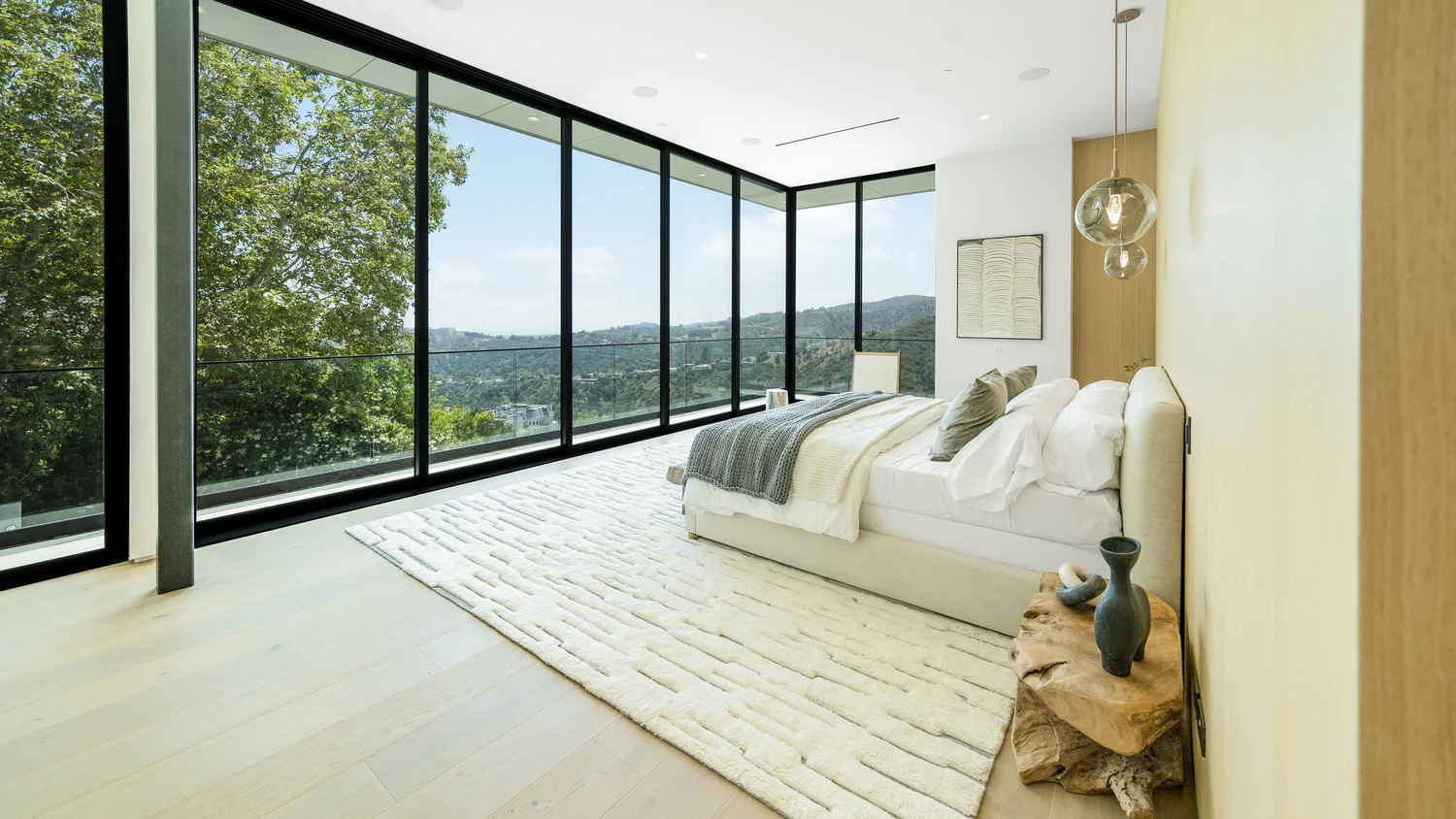 A bright luxury interior with large windows.